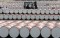 Oil prices rise with U.S. announcing dip in production