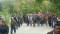 Large crowd under surveillance as hundreds mourn labour activist